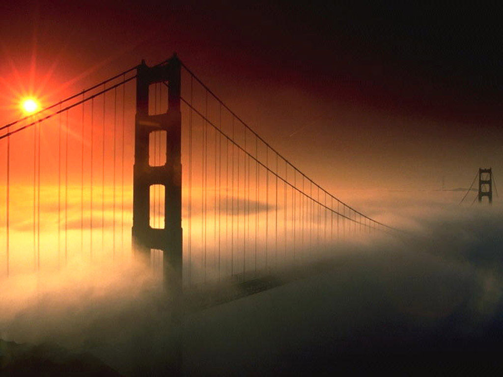 Golden-Gate-Bridge-submerged-under-fog-with-beautiful-sunlight